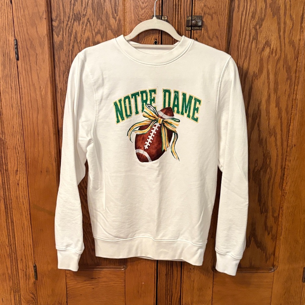 Notre Dame White Sweatshirt with Football Design